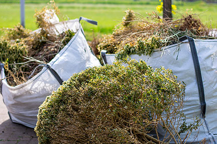 Removing waste from a garden in garden bags